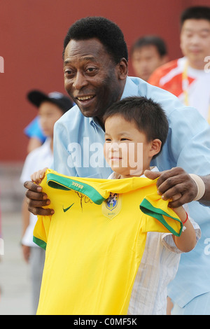 Former Brazilian footballing legend Pele at China's Imperial Palace where he presented signed footballs and football shirts to Stock Photo