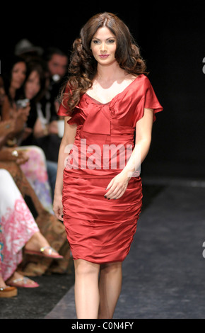 Cynthia Enid Olavarria Rivera Red dress for the American Heart Association fashion show during Funkshion Fashion week held at Stock Photo