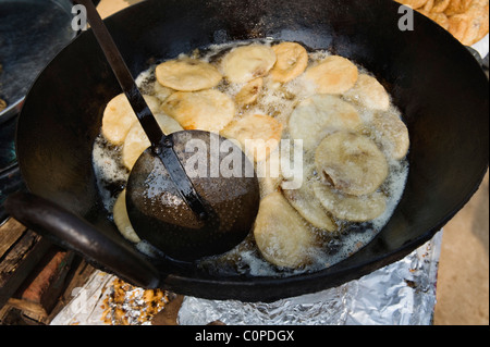 Close-up of kachories being fried in a wok Stock Photo