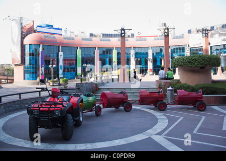 Toy train in front of a shopping mall, Ansal Plaza, New Delhi, India Stock Photo