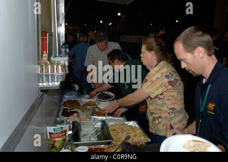 Firefighters and rescue workers eating after working all night Devastation left after the wildfires in Montecito, Santa Stock Photo