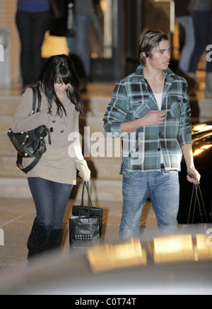Vanessa Hudgens and  Zac Efron do some last minute Christmas shopping together at Barney's of New York. Los Angeles, Stock Photo