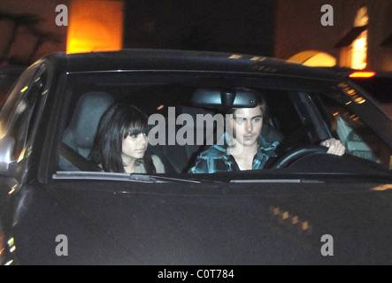 Vanessa Hudgens and  Zac Efron leaving Barneys in Zac's car after they do some last minute Christmas shopping together at Stock Photo