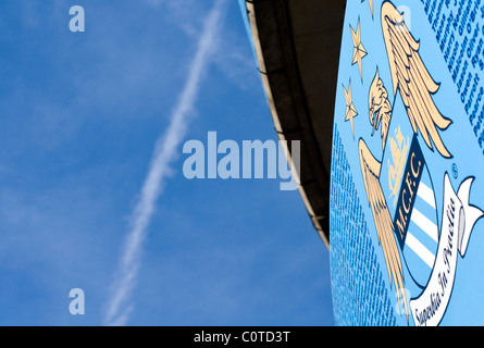 The club badge on the outside of a stand at Manchester City's Etihad football stadium in England