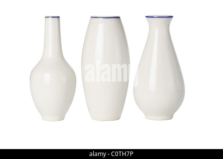 Chinese porcelain vases of various shapes on white background Stock Photo