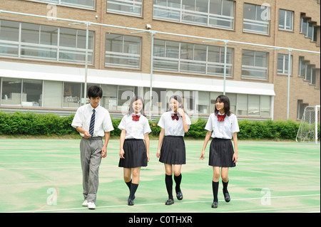 High School Students Walking on the Schoolyard