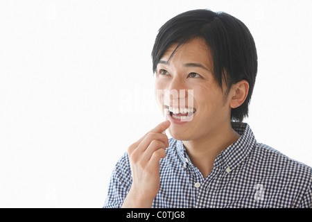Mid Adult Man Using Interdental Brush Stock Photo