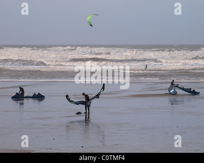 Kite surfers winter, Westward Ho!, Devon, UK Stock Photo