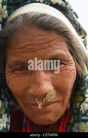 portrait of an older Tharu woman in Chitwan National Park in Nepal Stock Photo