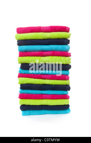 Pile of colorful towels over white background Stock Photo
