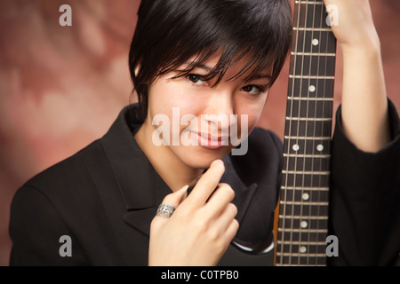 Young Girl With Electric Guitar Posing Over White Background Stock Photo,  Picture and Royalty Free Image. Image 17787991.