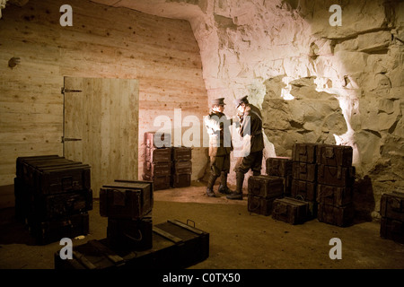 Recreation of a World War II scene with soldiers, Chislehurst Caves, Chislehurst, Kent, UK Stock Photo