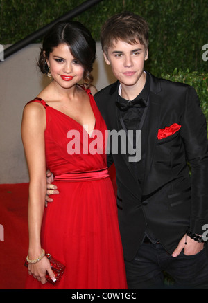 SELENA GOMEZ JUSTIN BIEBER 2011 VANITY FAIR OSCAR PARTY LOS ANGELES CALIFORNIA USA 27 February 2011 Stock Photo