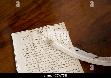 Quill Pen & Old Handwritten Letter Stock Photo