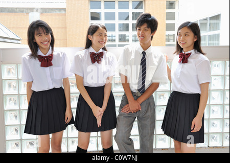 High School Students Talking at Hallway Stock Photo