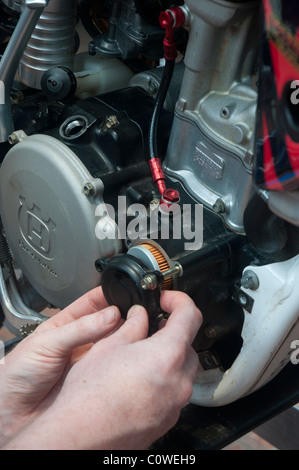 Oil and filter replacing maintenance Stock Photo - Alamy