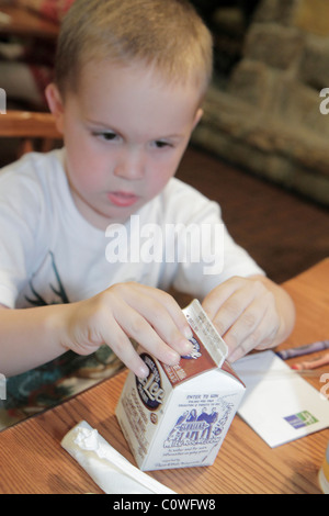 Orlando Florida,Cracker Barrel,restaurant restaurants food dining eating out cafe cafes bistro,young,preschool,boy boys lad lads male kid kids child c Stock Photo