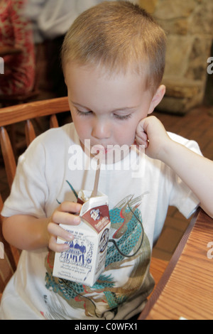 Orlando Florida,Cracker Barrel,restaurant restaurants food dining eating out cafe cafes bistro,young,preschool,boy boys lad lads male kid kids child c Stock Photo