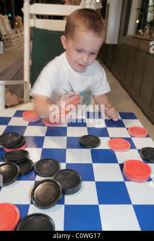 Orlando Florida,Cracker Barrel,restaurant restaurants food dining eating out cafe cafes bistro,Old Country Store,young,preschool,boy boys lad lads mal Stock Photo