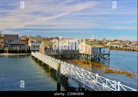 Wide angle view of the island from the ferry arriving at approaching Nantucket Harbor in the fall, Nantucket Massachusetts, USA. Wide angle view of the island from the ferry arriving at approaching Nantucket Harbor in the fall, Nantucket Massachusetts, USA.