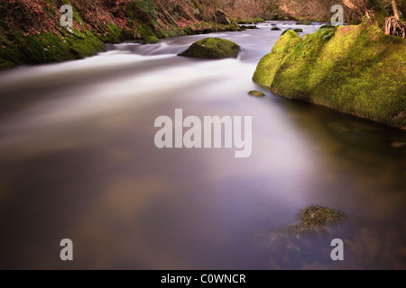 Llanystumdwy, Gwynedd, North Wales, UK, Britain. Afon Dwyfor River scene fast flowing water with motion blur in Welsh valley Stock Photo