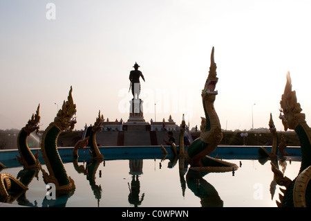 Statue of Chao Anouvong, the last king of the Vientiane monarchy, unveiled in November 2010, and Nagas fountain, Vientiane, Laos Stock Photo