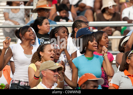 Excited fans react to finish of race at the Texas state high school track and field championships in Austin. Stock Photo