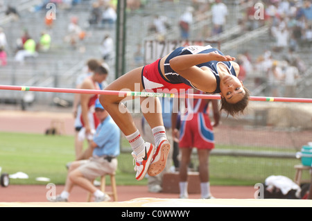 Female high jumper competes at the Texas state UIL high school state track meet at the University of Texas at Austin. Stock Photo