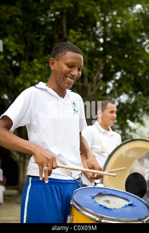 Children from Colombia playing musical instruments. The music project has been funded by Fairtrade banana exports Stock Photo