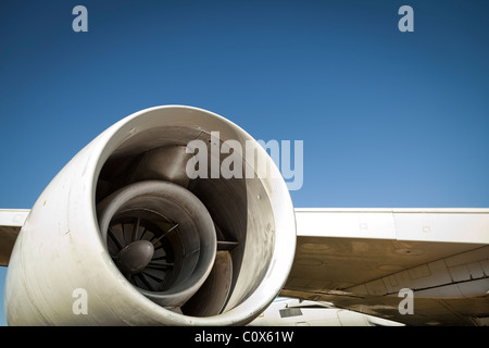 Jet aircraft plane details against blue sky. Engine.  Aircraft:  Convair CV-990 Stock Photo