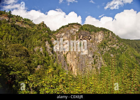 Taktsang Monastery perching on the edge of a high cliff near Paro town Stock Photo
