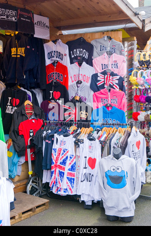 Camden Town or Lock or Horses Market , London , novelty & souvenir t shirt , vest & sweatshirt shop or store Stock Photo