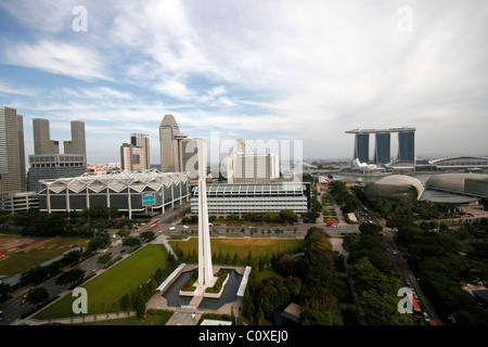 Wide angle view of Singapore - Memorial to Victims of Japanese Occupation, Marina Bay Sands Hotel and Casino Stock Photo