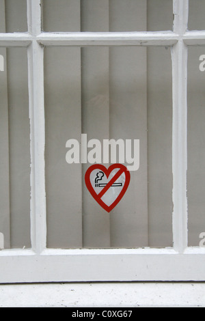 no smoking sign sticker in window Stock Photo