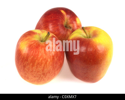 A Group of Three Whole Ripe Juicy Red Apples Against A White Backgorund Stock Photo