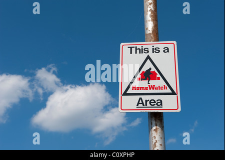 Home Watch area sign fixed to a lamp post in an English street. Stock Photo