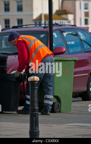 Street Cleaner Emptying Street Litter Bins Stock Photo