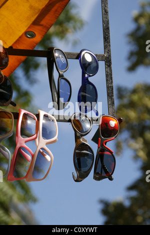 sunglasses on market stall Stock Photo