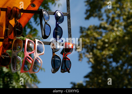 sunglasses on market stall Stock Photo