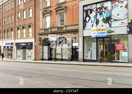 Nottingham shops closed to let in March 2011 during the economic crisis. Lacoste  and White Stuff clothing. Stock Photo