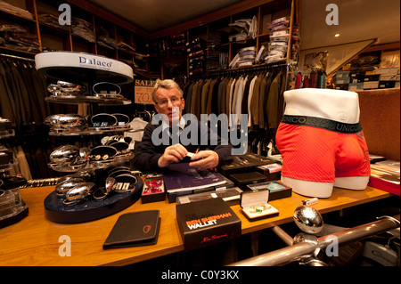 Brian John , the owner of a small independent mens clothing shop in Aberystwyth Wales UK Stock Photo