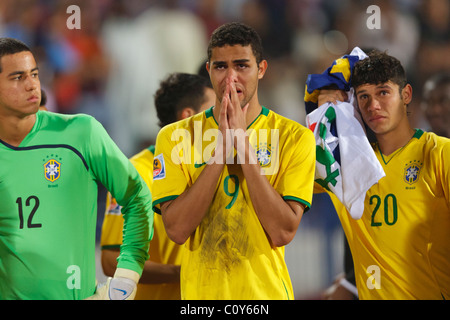 Brazil players Renan Ribeiro (12), Alan Kardec (9) and Ciro (20) react after being defeated by Ghana in the FIFA U-20 World Cup. Stock Photo