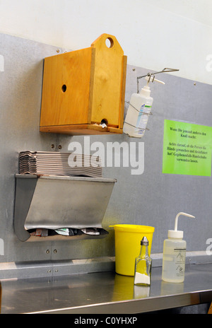 Inside a legal drug injection centre where addicts are provided with clean syringes, spoons, and rooms for safe injections. Stock Photo
