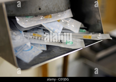 Inside a legal drug injection centre where addicts are provided with clean syringes, spoons, and rooms for safe injections. Stock Photo