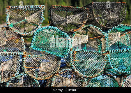 Stacked lobster creels / traps in the Plockton Harbour, Highlands, Scotland, UK Stock Photo