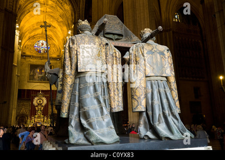 Tomb of Christopher Columbus & the interior and Altar of Seville Cathedral during Semana Santa Easter Holy week. Sevilla, Spain. Stock Photo