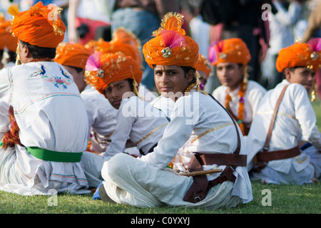 Young Indian men at the elephant festival in Jaipur, wearing orange turbans Stock Photo