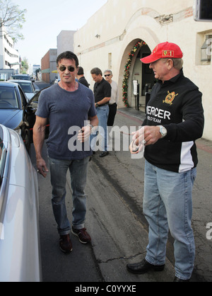 Frederic Prinz von Anhalt drives up in his new Rolls Royce drop-top Phantom and shows it off to Sylvester Stallone at the The Stock Photo