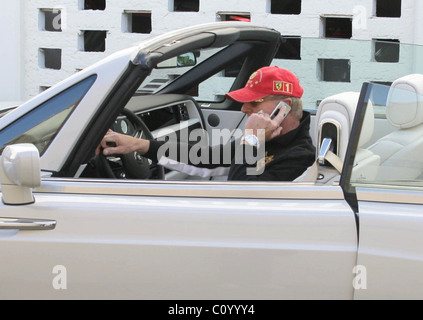 Frederic Prinz von Anhalt drives up in his new Rolls Royce drop-top Phantom and shows it off to Sylvester Stallone at the The Stock Photo