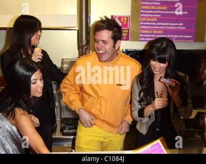 Perez Hilton, Khloe Kardashian, Kim Kardashian and Kourtney Kardashian at Millions of Milkshakes Los Angeles, California - Stock Photo